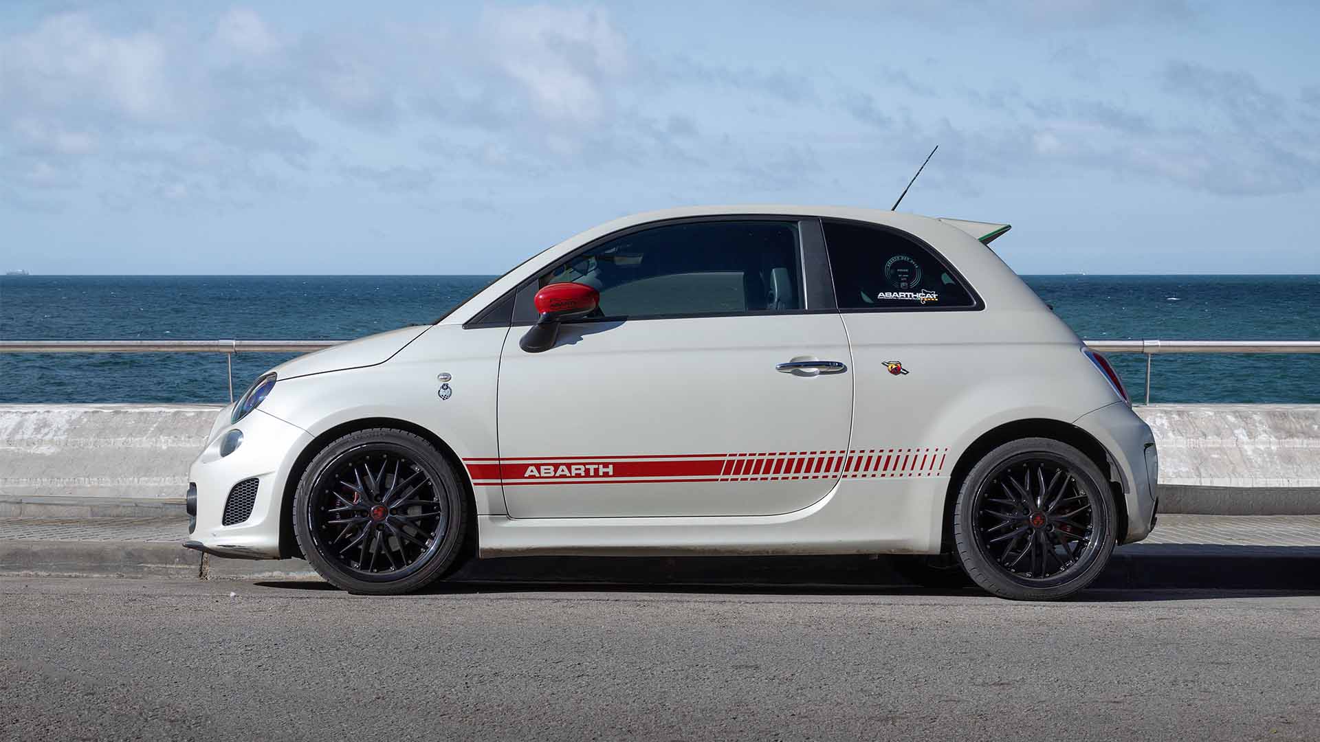 White Fiat At Beach