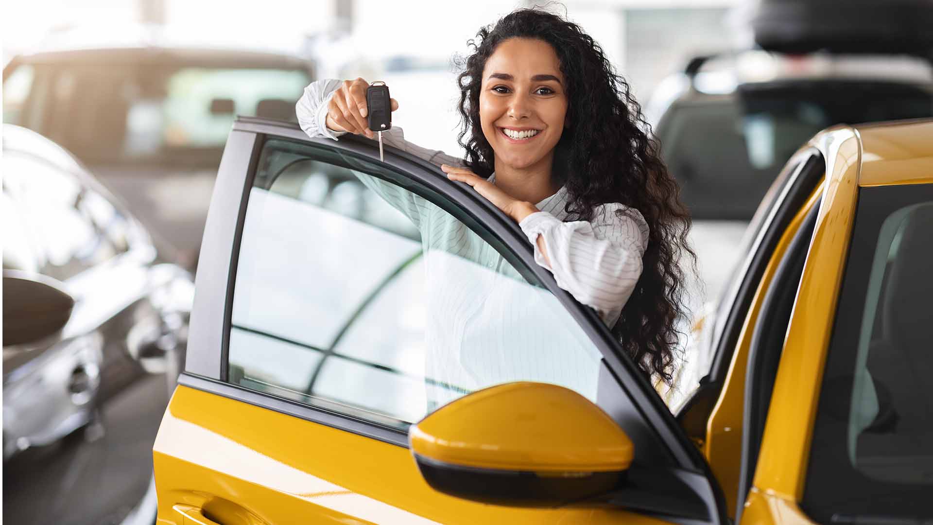 Woman Getting Out Yellow Car