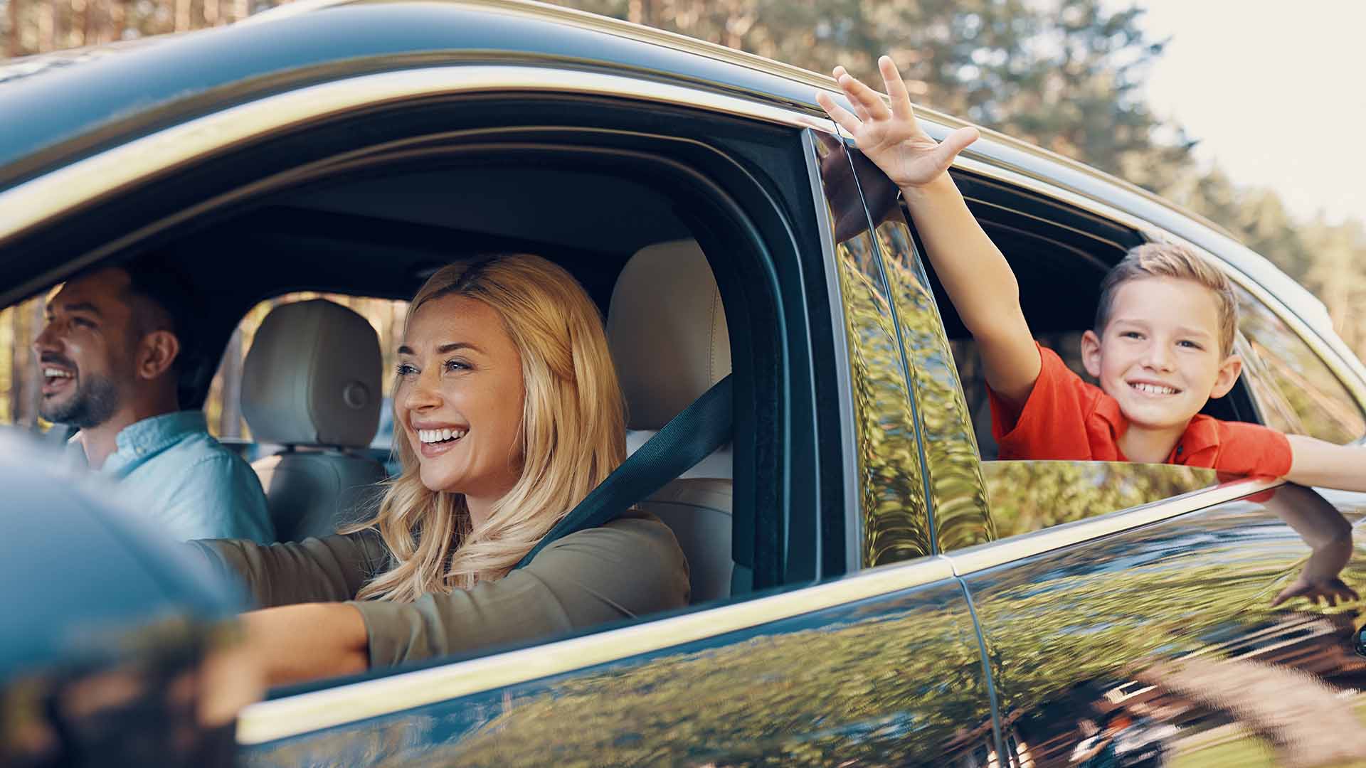 Family Driving Child In Window