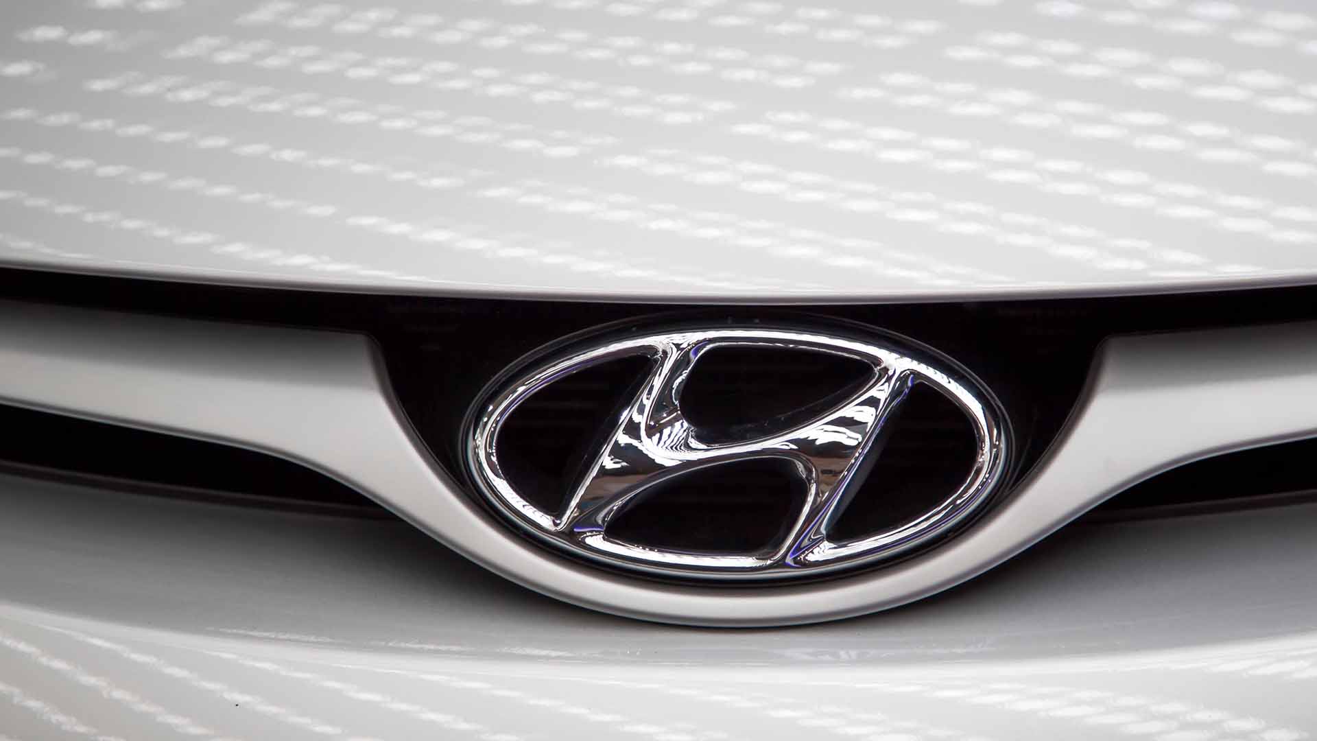 White Honda Badge